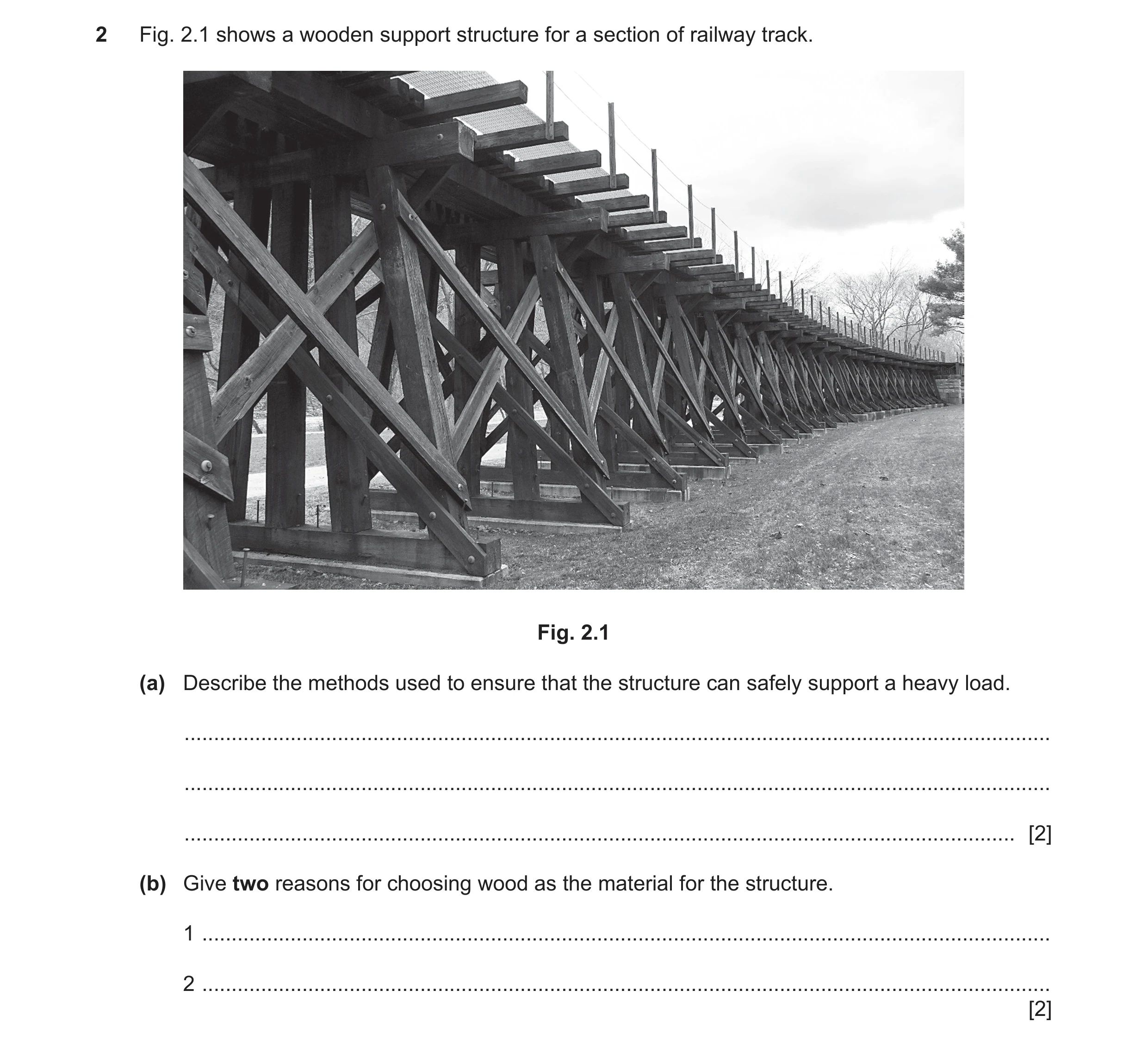 Question 95: Fig. 2.1 shows a wooden support structure for a section of railway track. Fig. 2.1 (a) Describe the methods used to ensure that the structu…